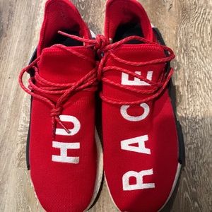 Human race adidas shoes, color red size 11. Mildy worn.